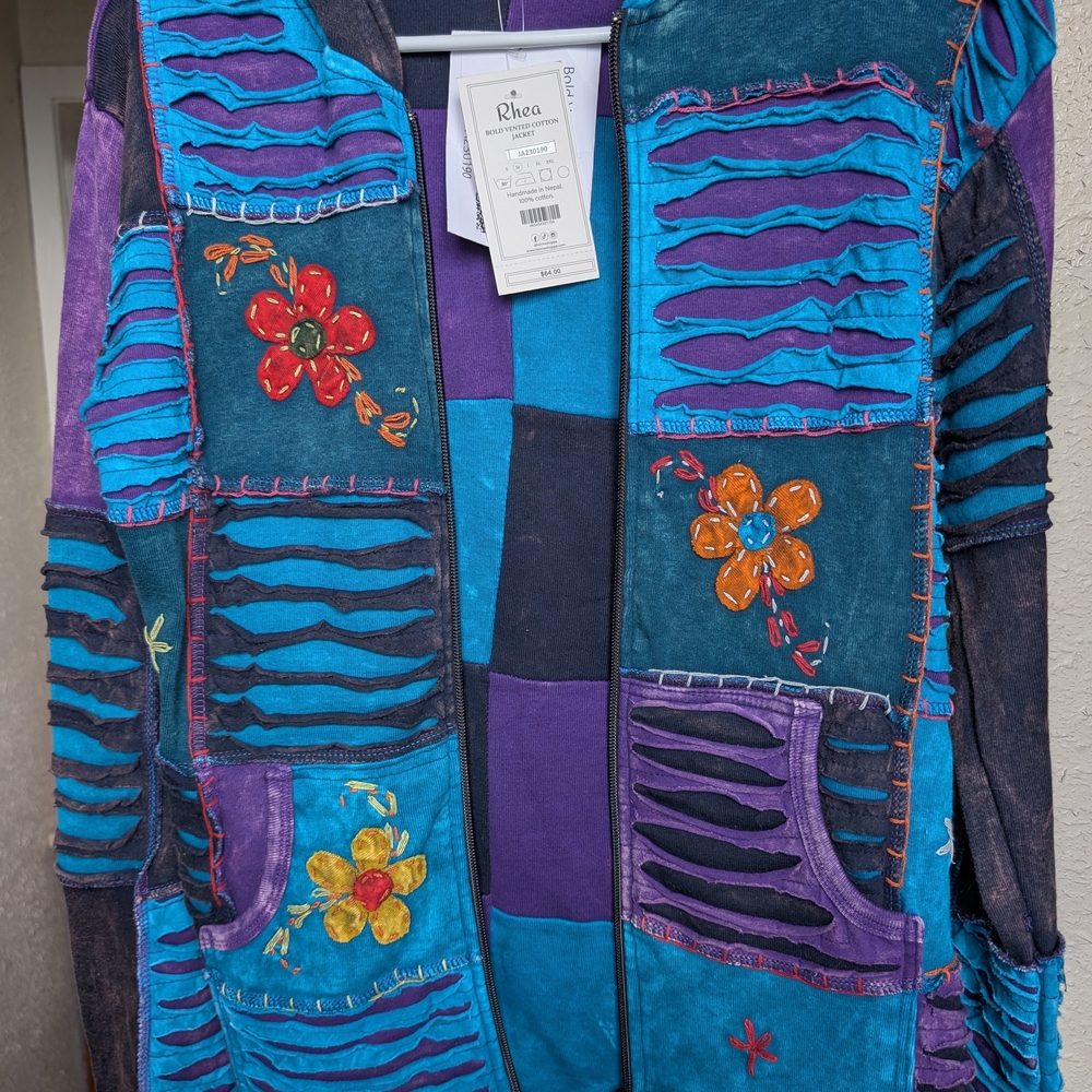 Colorful Patchwork Jacket with Floral Accents